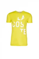 T-shirt Lacoste 	arany	