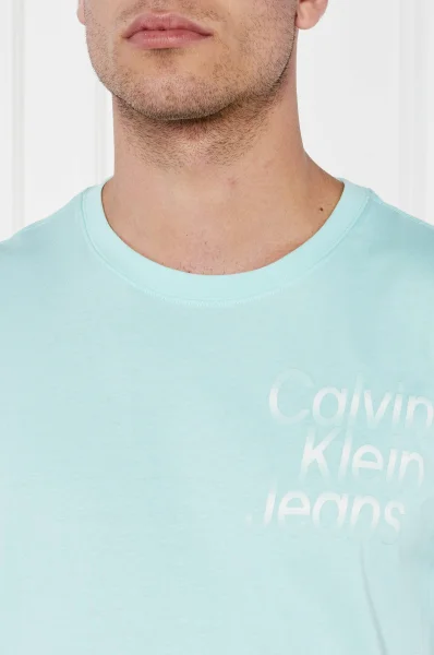 Póló DIFFUSED STACKED | Regular Fit CALVIN KLEIN JEANS 	menta	